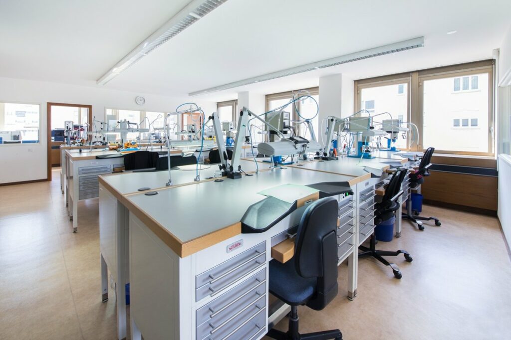 Swiss watchmaking workshop assembling a Swiss-Made timepiece